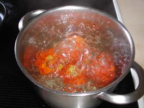 Peel the tomatoes in boiling water